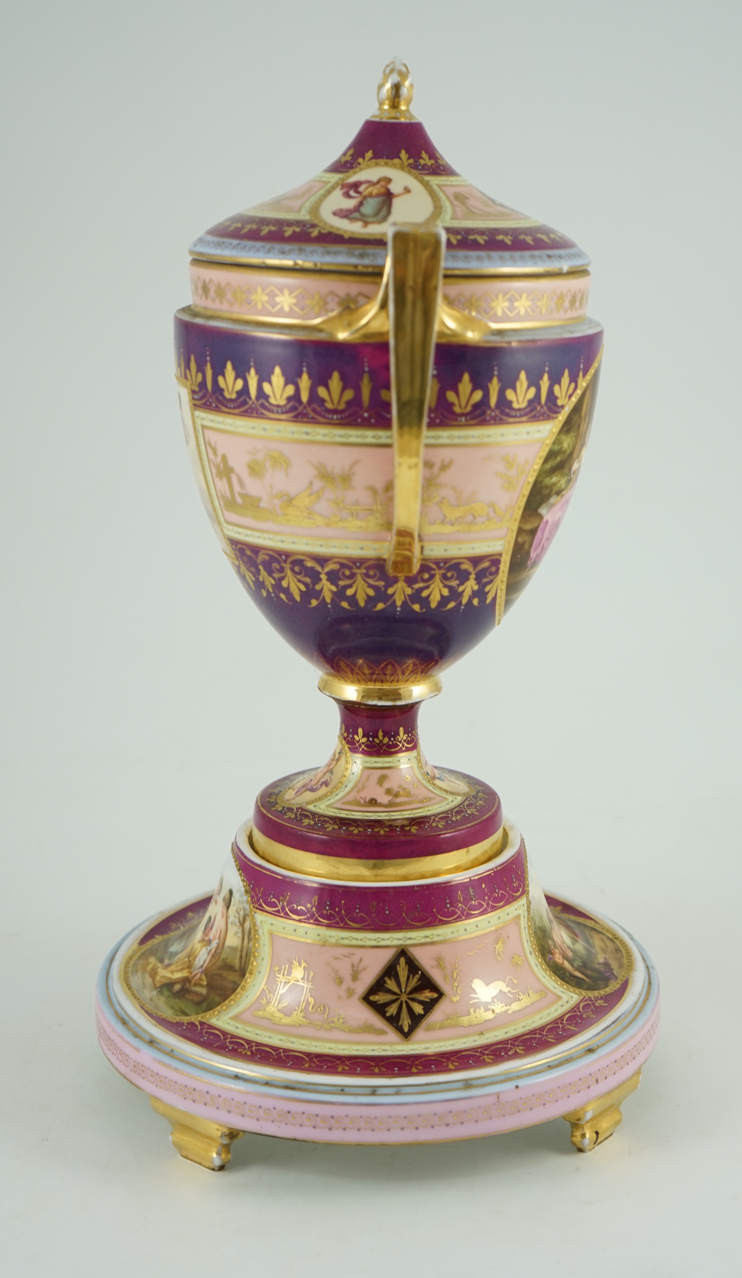 A Vienna style porcelain two handled cup, cover and stand, late 19th century, 42 cm high